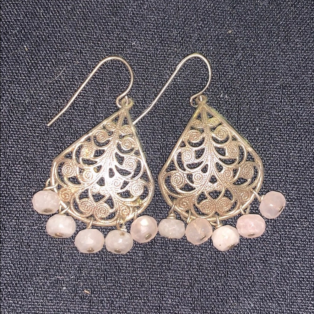 Earrings with dangly pink gems